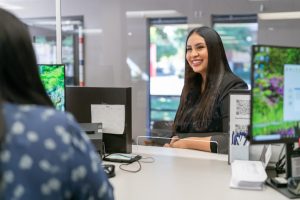 Woman Opening a Savings Account at a Bank